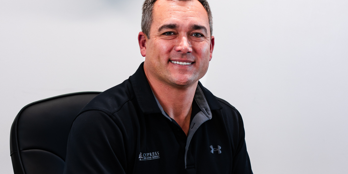 Brody Hulin, President of Cypress Fabrication Services in Lafayette, LA sitting at his desk
