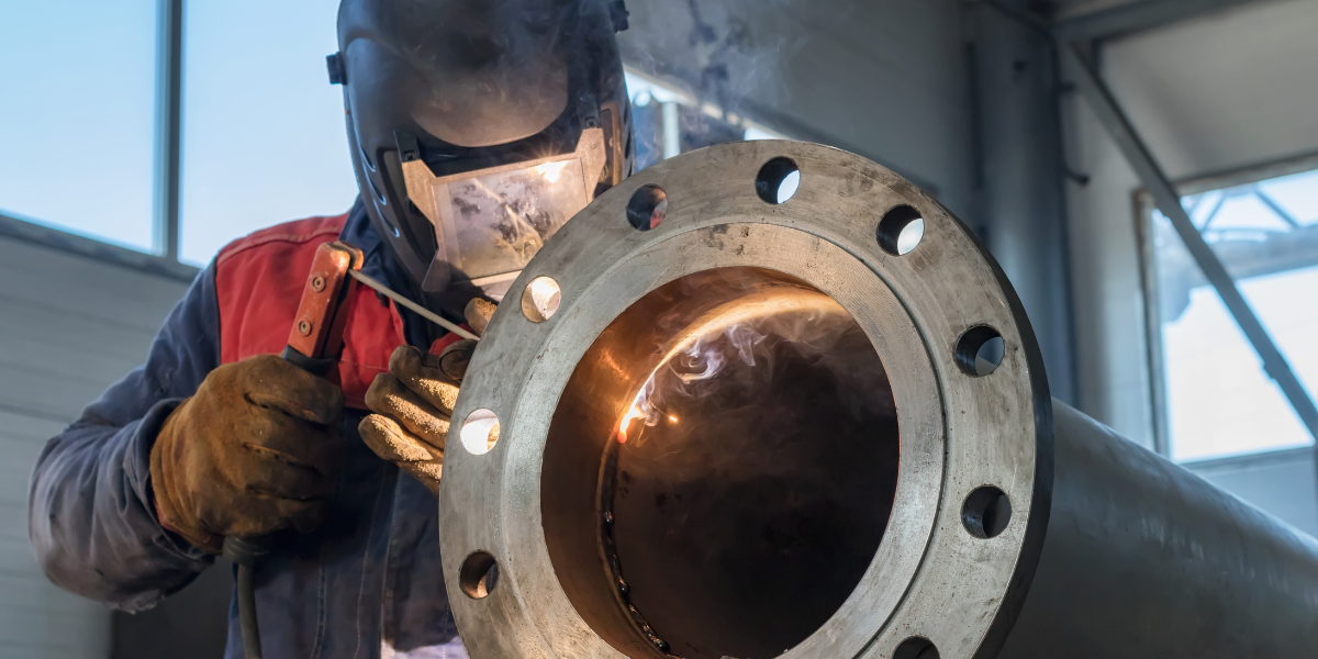 Welder welding stainless steel super duplex pipe at Cypress Fabrication 