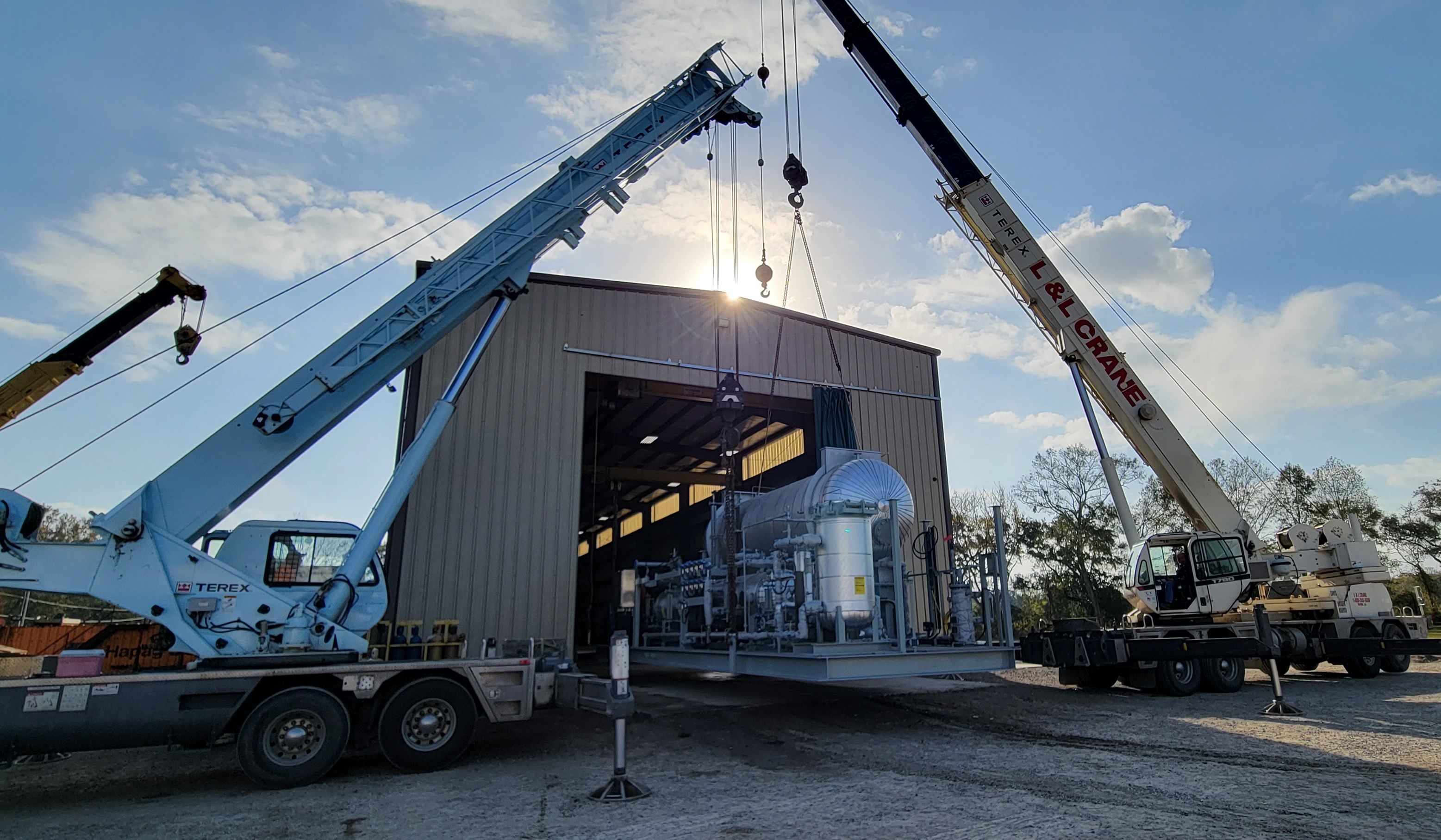 Cypress Fabrication's cranes lifting an ASME pressure vessel from their facility in Lafayette, Louisiana